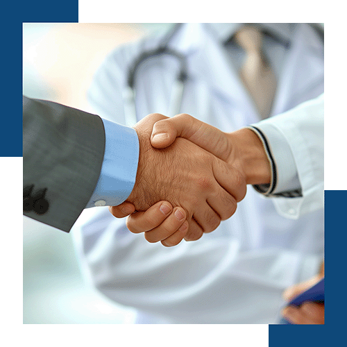 physician and businessman shaking hands