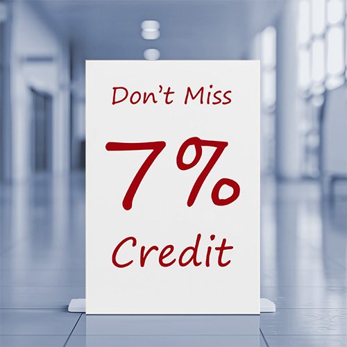 sign in hallway that says don't miss 7% credit